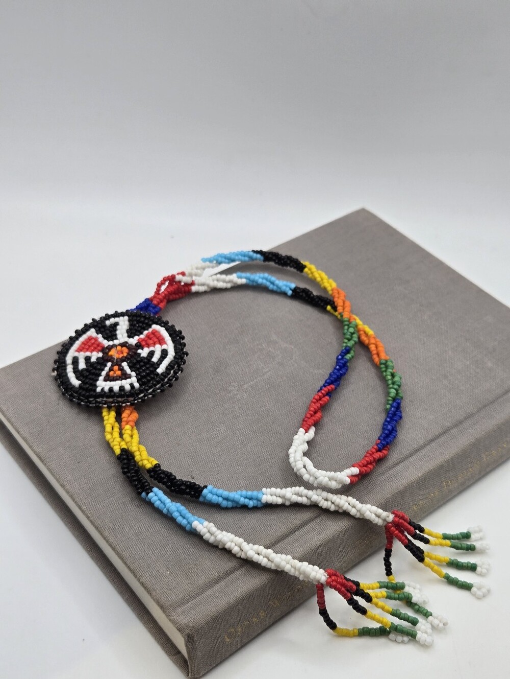 Vintage Southwest Bolo Tie Seed Beaded Thunderbird Rosette Folk Art Western